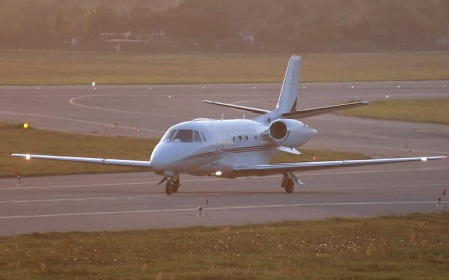 A light business jet taxiing for takeoff